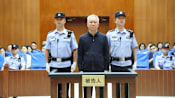 China jails Evergrande founder for life, fines firm more than US$2 billion
