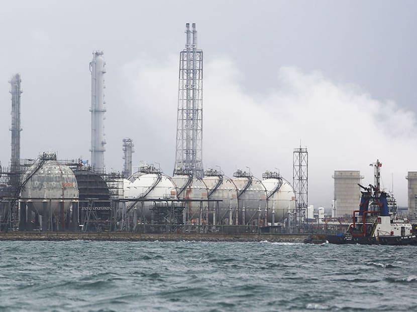 Explainer: Crude oil price well down from its 14-year peak — will S'pore's pump prices follow suit?