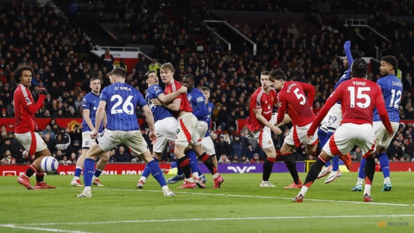 Maguire earns 10-man Manchester United vital victory over Ipswich