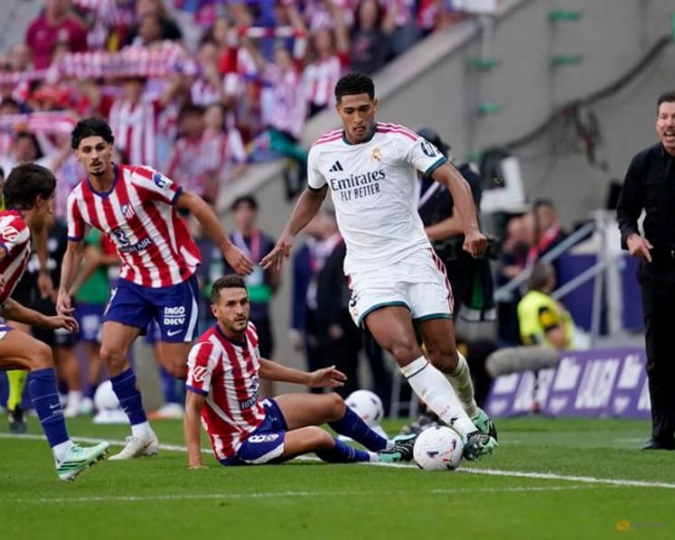 Atletico ride derby storm to beat 10-man Real Madrid 2-1