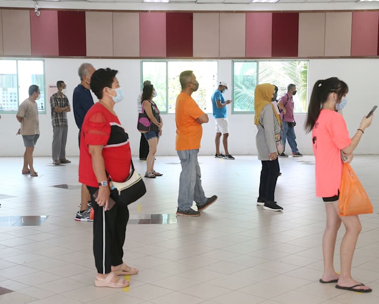 Queues form at Marsiling CC for TraceTogether tokens following new collection rules