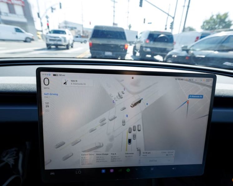 US ends probe into Tesla remote driving feature after software updates