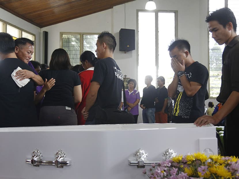 Villagers paying their last respects to Valerian Joannes, mountain guide that was killed in Friday's (June 5) earthquake, at a church at Kampung Bundu Tuhan, Sabah. Joannes accompanied the group of Tanjong Katong Primary School Students and teachers on their expedition on Mount Kinabalu. Photo: Raj Nadarajan/TODAY