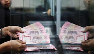 Indonesia raises rates in surprise move to prop up sinking rupiah