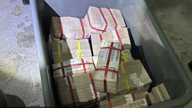 泰国女子垃圾场捡到塑料箱 内藏逾47万现金