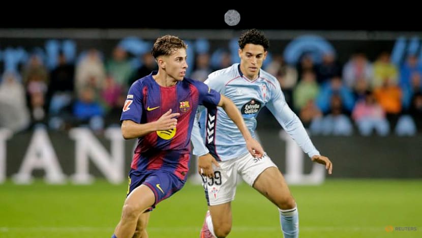 Lewandowski hat-trick steers Barcelona to 4-2 win at Celta Vigo