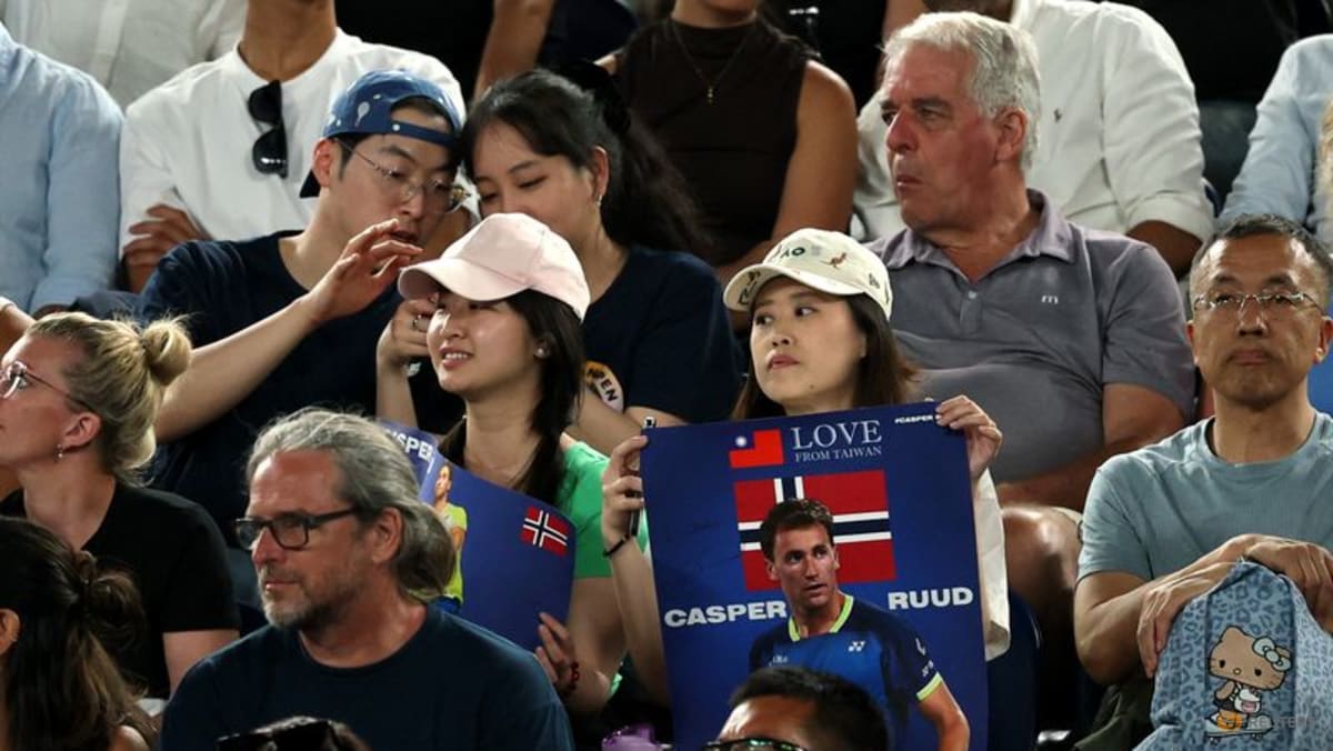 Organisers invoke extreme heat policy on hottest day at Australian Open