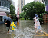 Typhoon Dolphin weakens but disrupts travel in east China