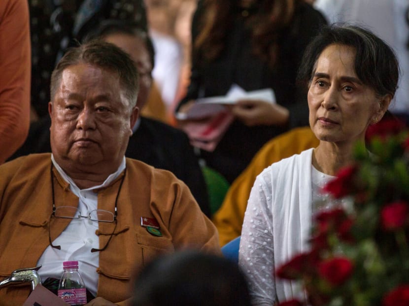 This file photo taken on August 17, 2017 shows Win Htein (left), chief executive committee member of the National League for Democracy (NLD) and a key aide to Myanmar's State Counselor Aung San Suu Kyi.