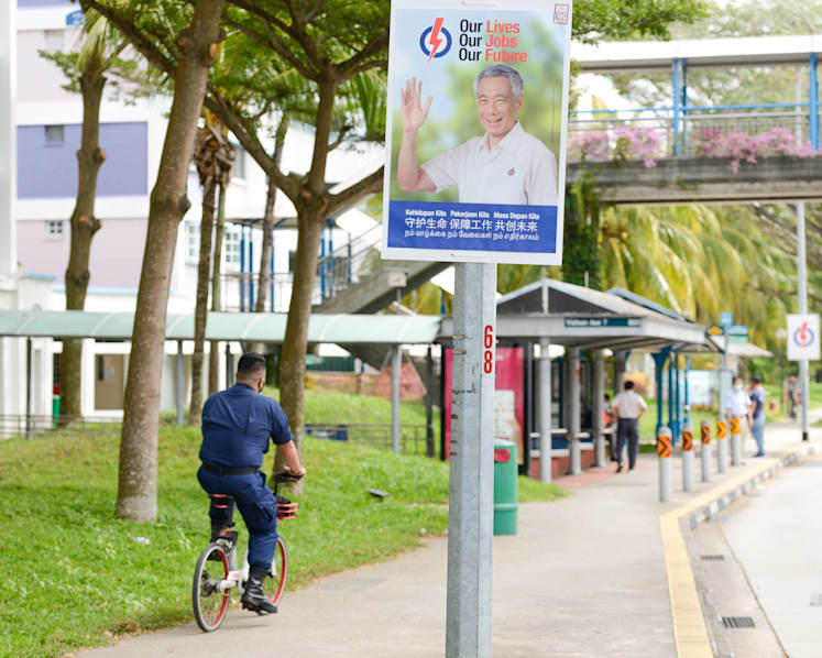 Man fined S$1,000 for destroying PAP poster bearing PM Lee’s image during GE2020