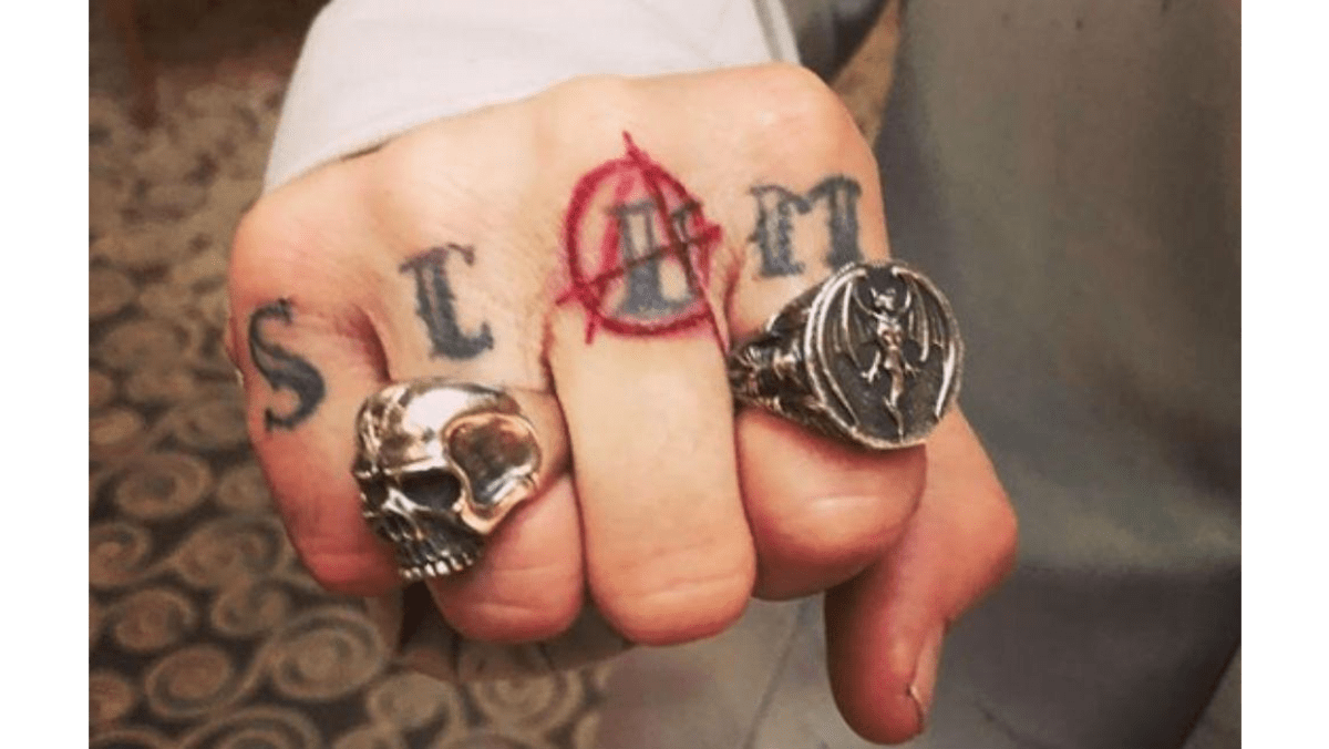 Johnny Depp tweaks Amber Heard 'SCUM' tattoo - 8days