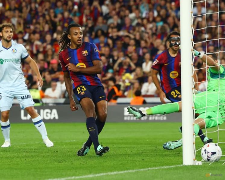 Barcelona cruise past Getafe to maintain perfect start