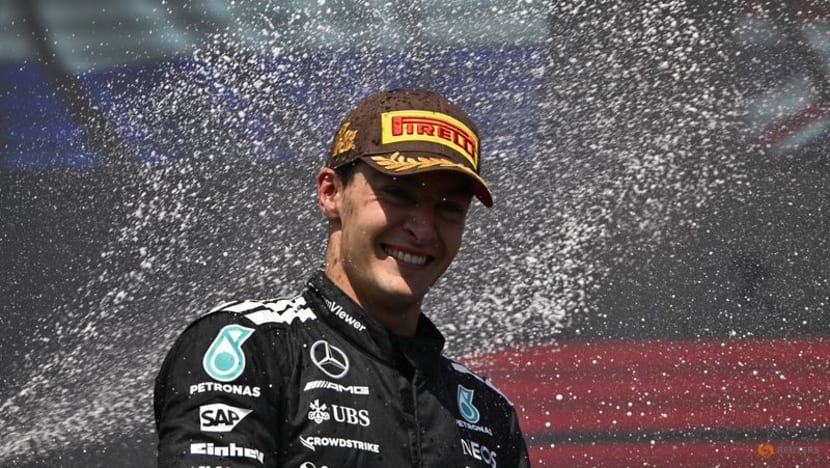 Russell wins in Canada as McLarens collide