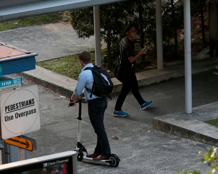 E-scooter footpath ban: LTA issues over 100 warnings on first day, NParks reminds riders to keep off the grass
