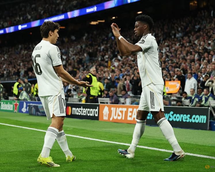 Vinicius scores as Real Madrid sink Benfica to reach Champions League last 16