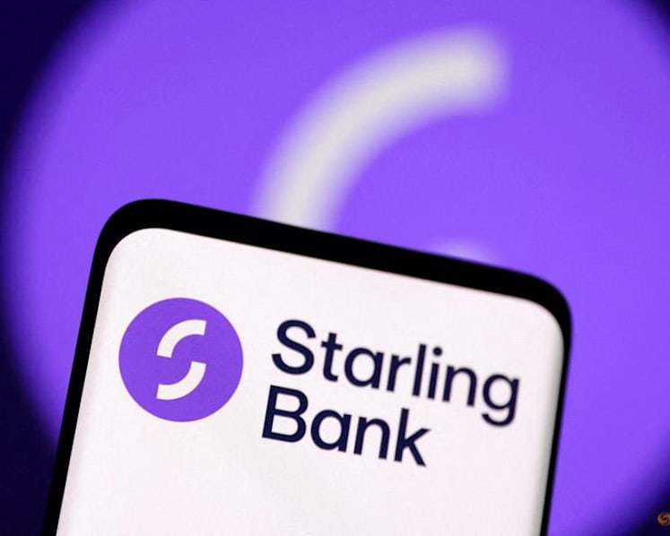 UK's Starling signs software deal with Canada's Tangerine, plans 100 hires