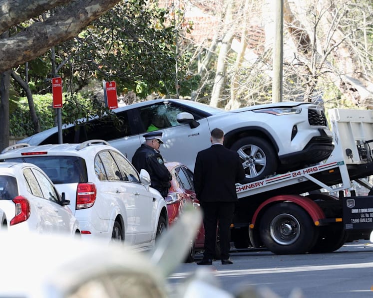 Man arrested after car crashes into Russian consulate in Sydney