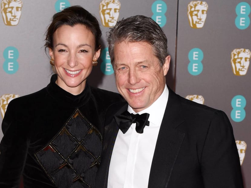 Hugh Grant Reacts To Claim He Married Wife For ‘Passport Reasons”