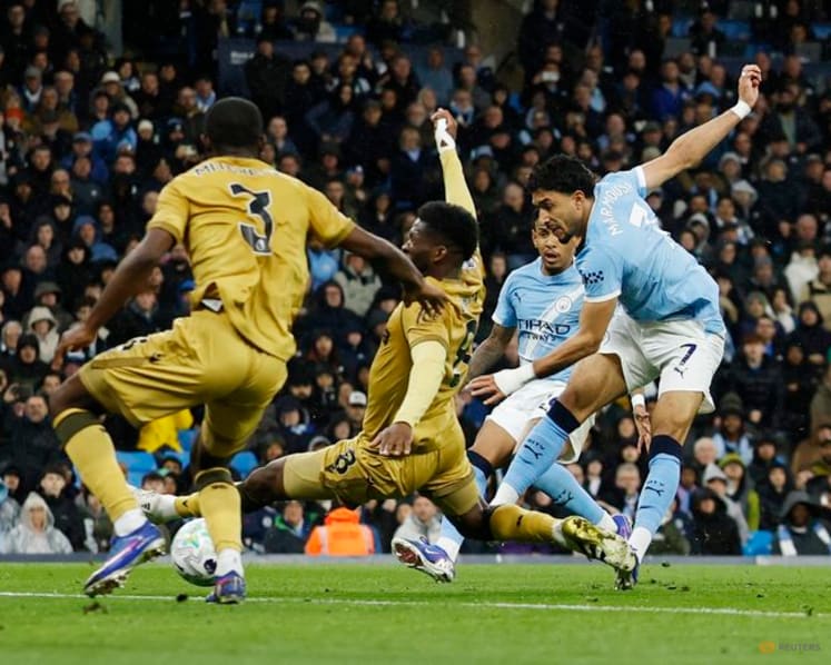 City slice Arsenal's league lead to two points with 3-0 win over Palace