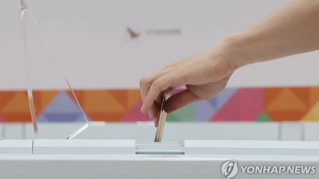 韩国总统选举提前投票活动结束 投票率将近35%创下历来第二高