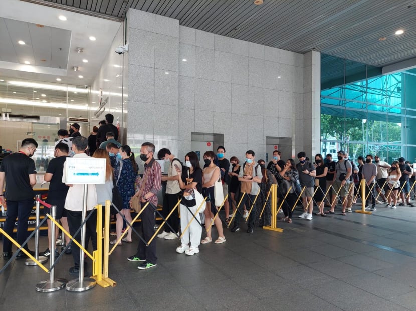 'I have a backache now': People wait for hours to collect passports at ICA building&nbsp;