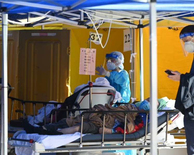 Commentary: Hong Kong is caught between Beijing and a deadly Omicron wave