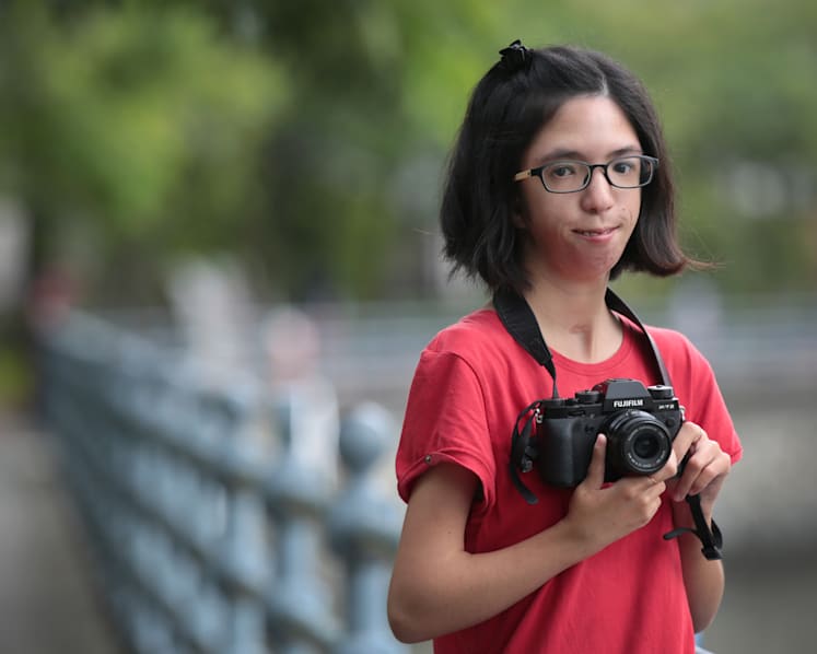 Living with grace through the lens of photographer born with disability