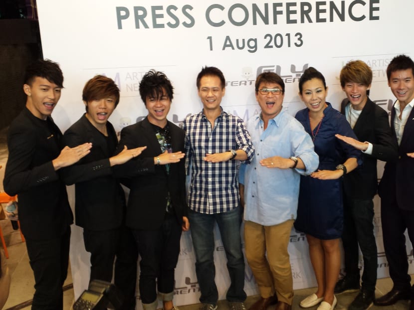 The cast of Ah Boys To Men with FLY Entertainment's Irene Ang,_J Team's Jack Neo, and mm2 Entertainment’s Ng Say Yong. Photo: FLY Entertainment.