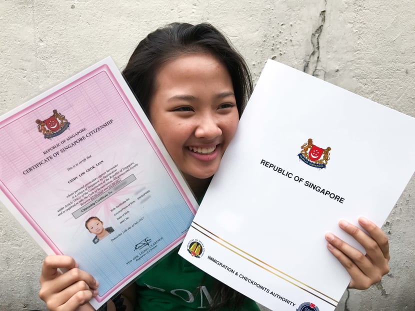 Previously stateless, Cindy Lim, 11, received her citizenship certificate from the Immigration and Checkpoints Authority on July 13, 2017, officially making her a Singaporean. Photo: Wong Pei Ting Previously stateless, Cindy Lim, 11, received her citizenship certificate from the Immigration and Checkpoints Authority on July 13, 2017, officially making her a Singaporean. Photo: Wong Pei Ting