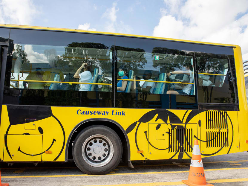 Passengers from Singapore boarding the first vaccinated travel lane bus to Malaysia at Queen Street Bus Terminal on Nov 29, 2021.