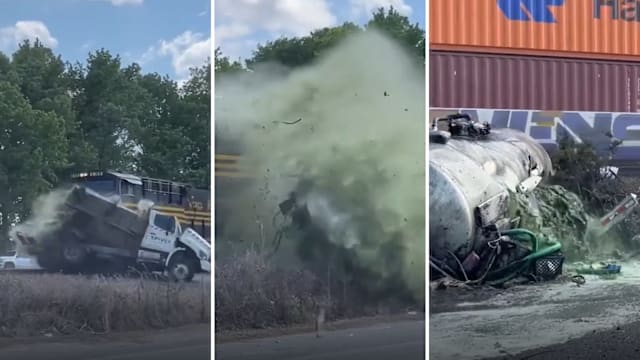 美国列车撞飞吸粪车 储罐爆裂绿色液体喷溅