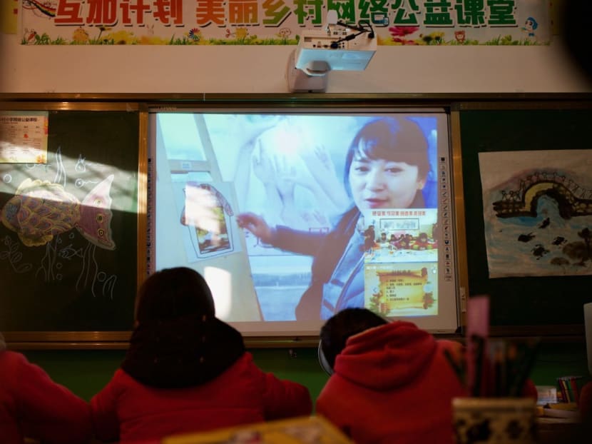 Students in Gansu province take part in a live streaming class. With high bandwidth internet technology, students at rural schools in the north-western China can take part in interactive online learning. Photo: South China Morning Post