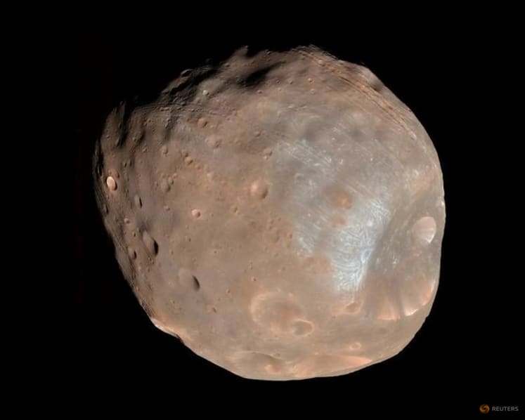 Japan launches mission to return samples from Mars moon