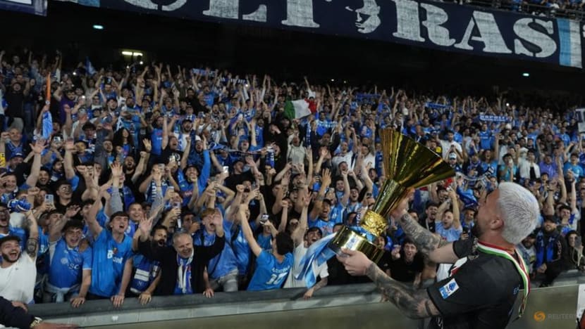 Euphoric Napoli fans flood streets for champions tour by land and sea