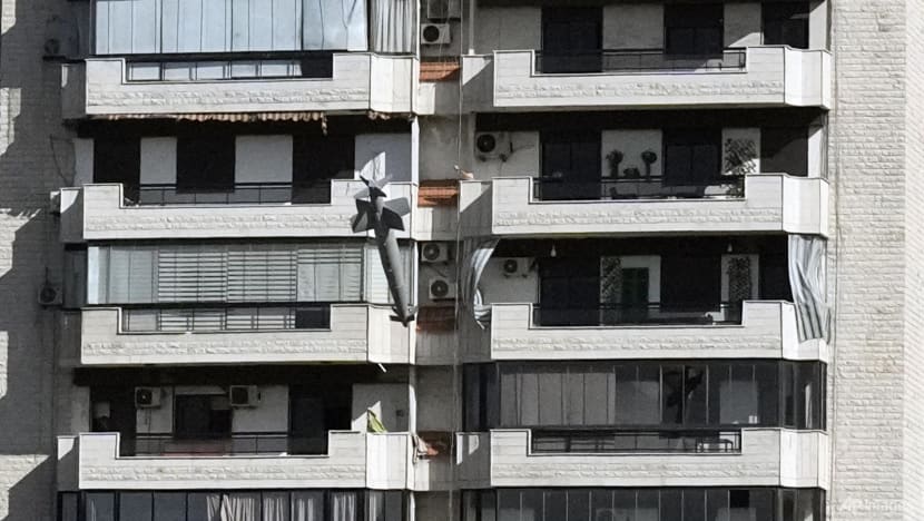 Photos capture exact moments an Israeli missile strikes building in Beirut