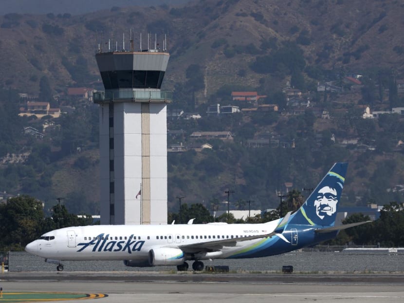 The control tower at Hollywood Burbank Airport stands over an Alaska Airlines plane as it taxis on Sept 25, 2023 in Burbank, California. The control tower at Hollywood Burbank Airport stands over an Alaska Airlines plane as it taxis on Sept 25, 2023 in Burbank, California.