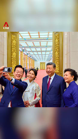 South Korean President Lee Jae-myung takes selfie with China's Xi using Xiaomi phone