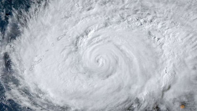 Japan orders evacuations as Typhoon Dolphin approaches, suspends flights and Toyota work