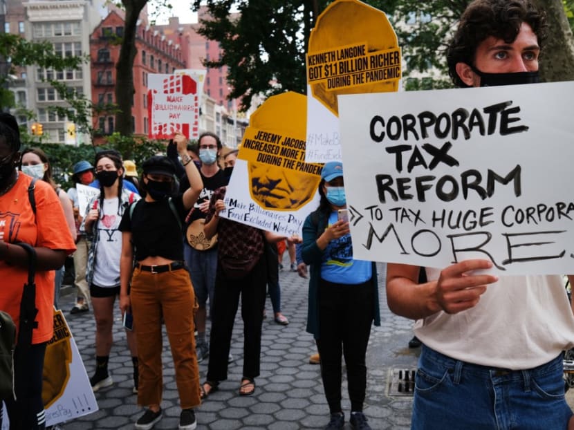 People participate in a "March on Billionaires" event on July 17, 2020 in New York City. People participate in a "March on Billionaires" event on July 17, 2020 in New York City.