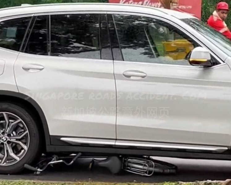 Cyclist, 31, taken conscious to hospital after accident in Bedok involving BMW car 