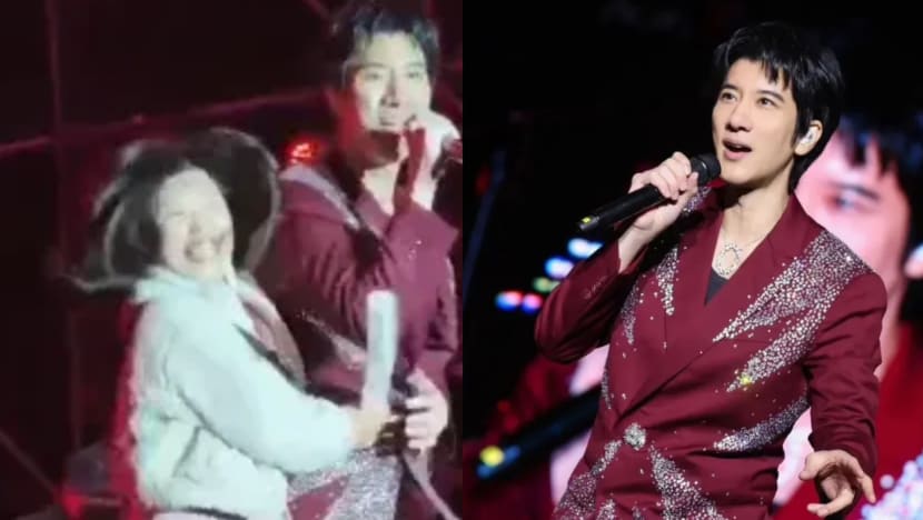 Female Fan Rushes Onto Stage To Hug Wang Leehom From Behind In The Middle Of Performance Female Fan Rushes Onto Stage To Hug Wang Leehom From Behind In The Middle Of Performance