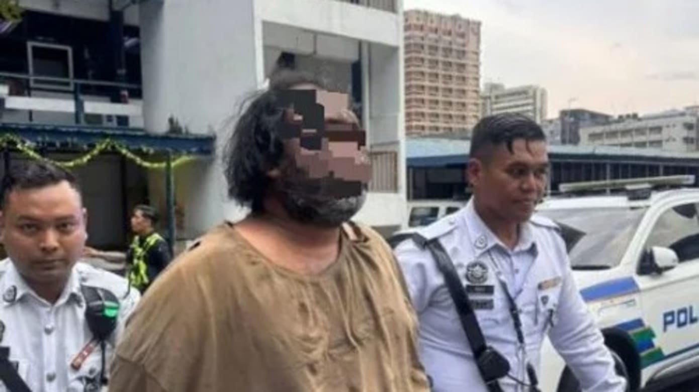 嫌犯被警员逮捕。（图：中国报）