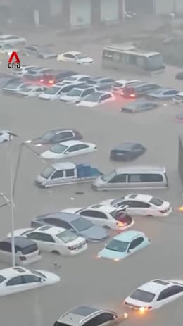 Torrential rains flood southern China, forcing evacuations and submerging vehicles