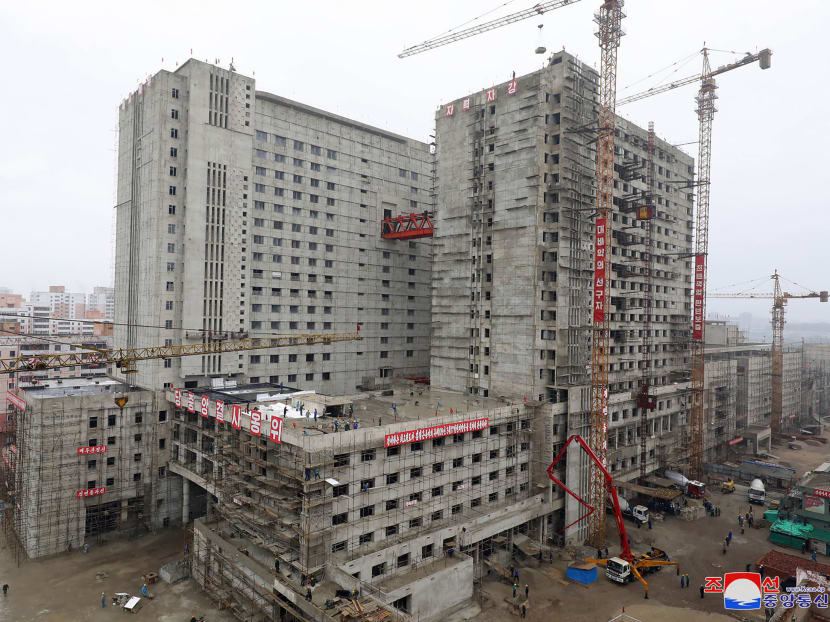 This undated picture released from North Korea's official Korean Central News Agency (KCNA) on July 20, 2020 shows the Pyongyang General Hospital under construction. The North's medical infrastructure is seen as woefully inadequate to deal with any epidemic and Pyongyang closed its borders in late January in an effort to protect itself against the coronavirus.