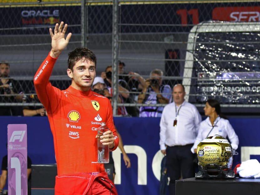 Ferrari's Charles Leclerc waving to spectators after clinching pole position in the Singapore Grand Prix on Oct 1, 2022. Ferrari's Charles Leclerc waving to spectators after clinching pole position in the Singapore Grand Prix on Oct 1, 2022.
