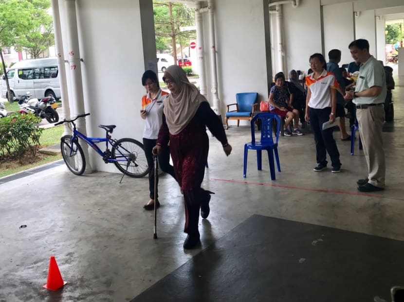The IPPT-S assesses flexibility, balance, strength, power and cardio-respiratory endurance through physical tests such as sit-and-reach, back scratch, grip strength, as well as a 10m walk. PHOTO: SGH