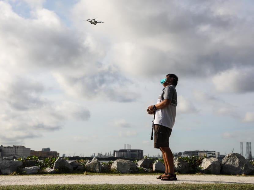 An enthusiast flying a drone at the unmanned aircraft flying area at Pandan Reservoir on July 17, 2022. An enthusiast flying a drone at the unmanned aircraft flying area at Pandan Reservoir on July 17, 2022.