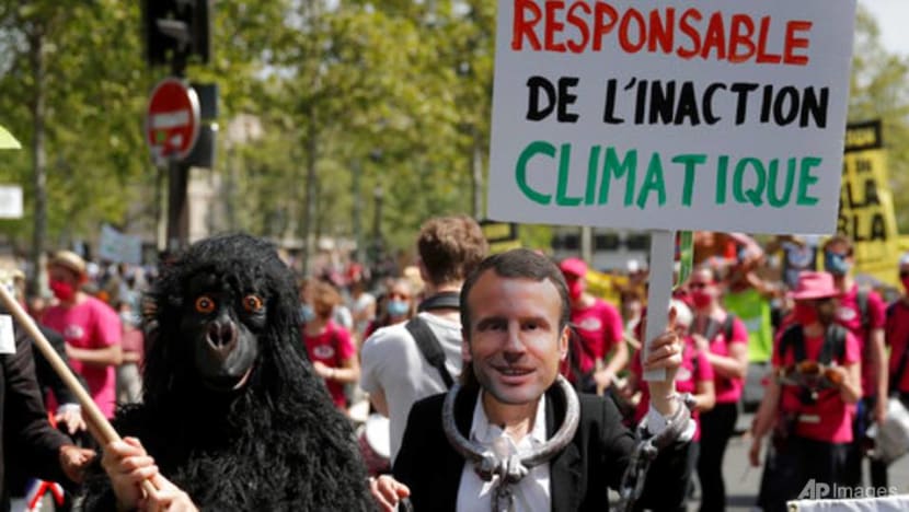 Thousands march in France as Macron takes climate plan to Senate Thousands march in France as Macron takes climate plan to Senate