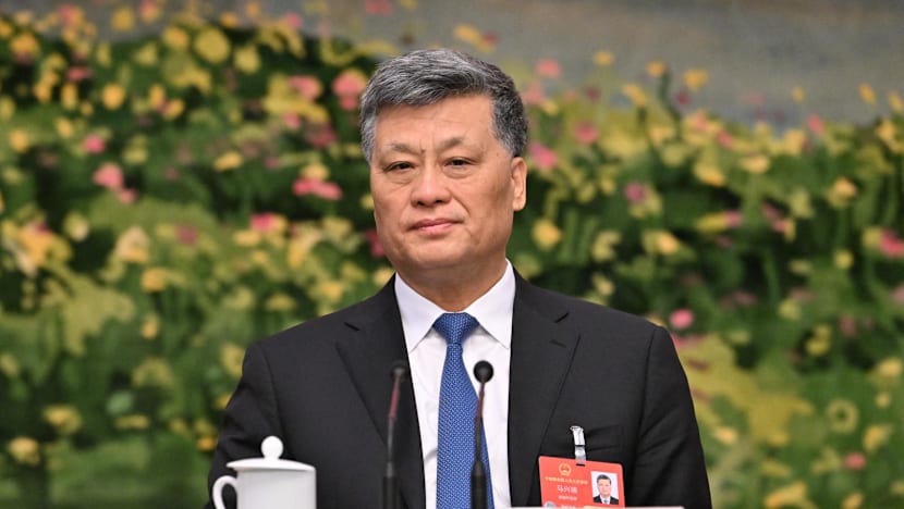 China strips generals, ex-financial regulator, politburo member of lawmaker posts
