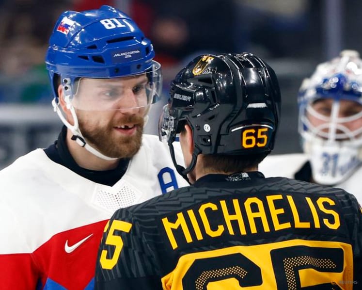 Ice hockey-Slovakia muscle past Germany into semi-finals